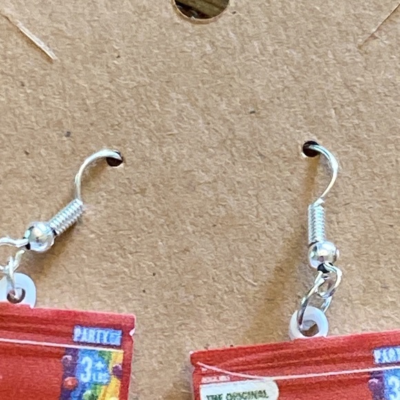 earrings with silver wires and a random gift bag - Picture 3 of 4